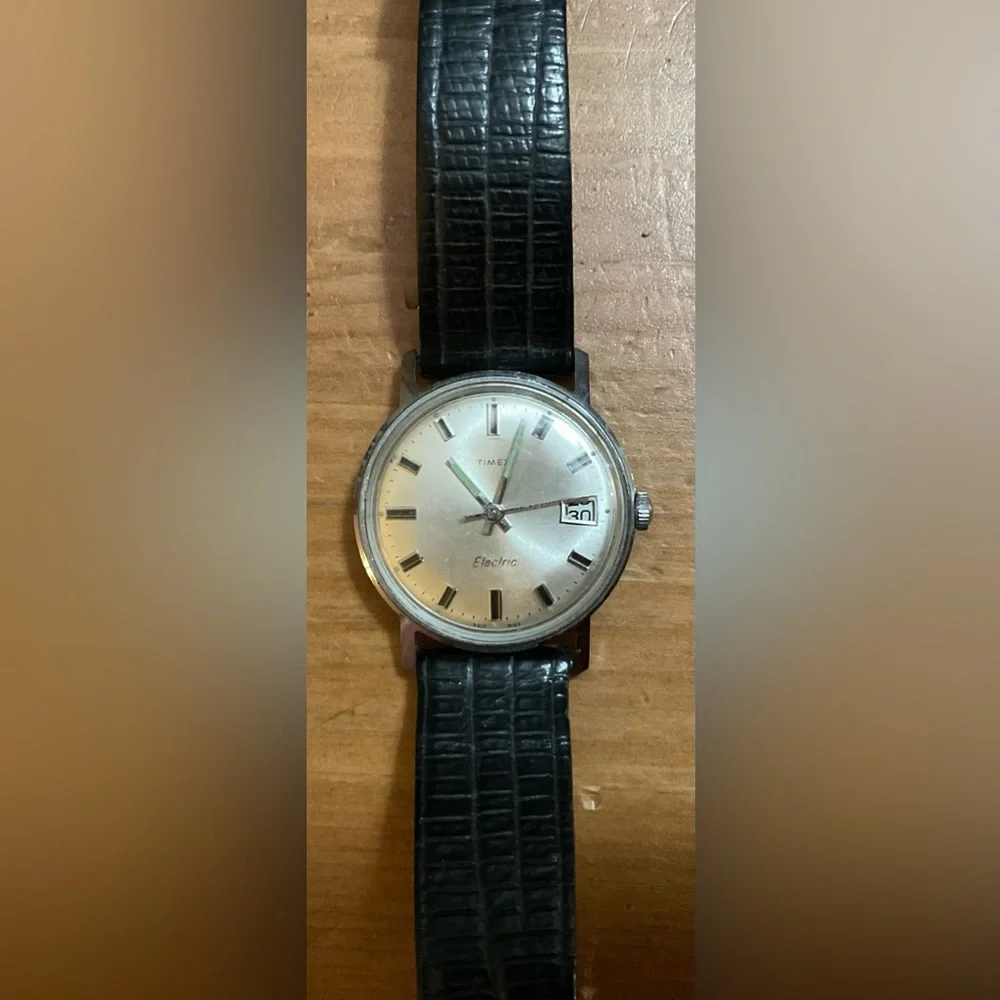Timex: Men’s vintage (rare find) electromechanical wrist watch black wrist band.